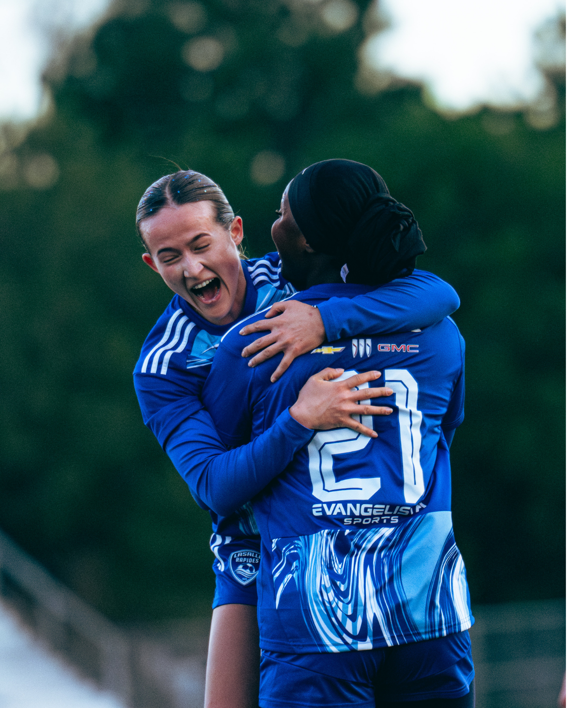 CS LaSalle players celebrating together during a match